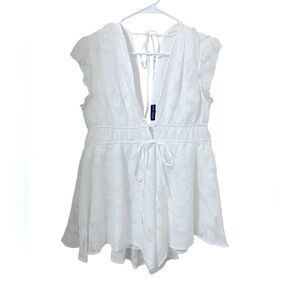 💙FOURTEEN TWELVE SIZE LARGE. White Sleeveless Tie-Back Romper.
